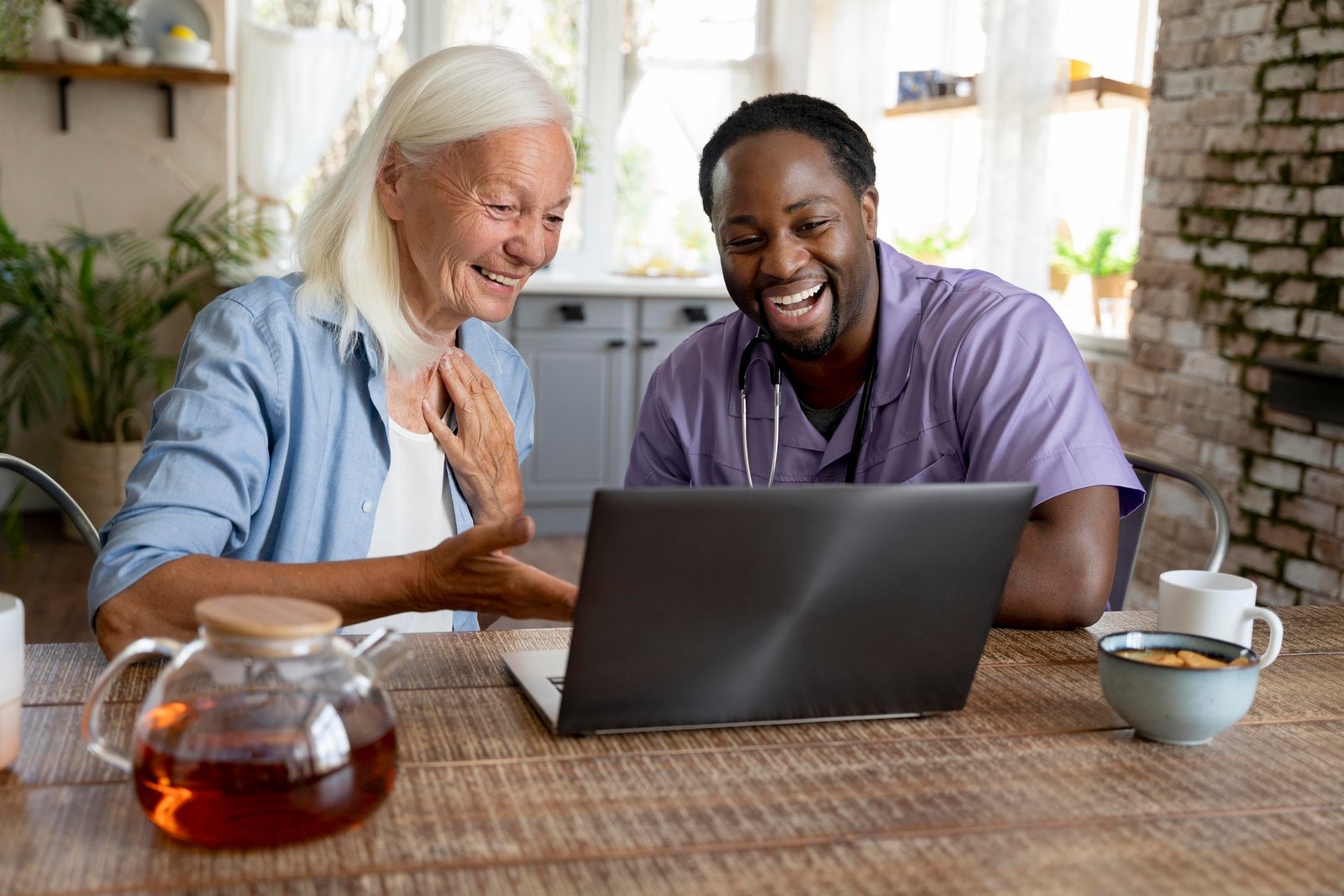 A clinician in a video consultation with an older adult at home